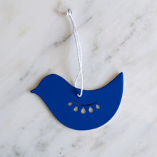 Blue dove and bird metal Christmas ornament with scalloped wing cutout, Scandinavian design, on hemp cord